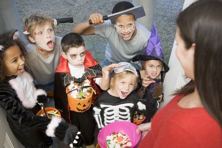 group of kids trick or treating