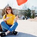 Woman curbing your smoking/vaping addiction with Yummy Lix Lollipops