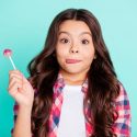 Girl eating lollipop