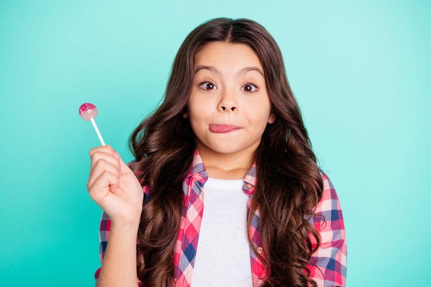 Girl eating lollipop