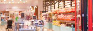 Blurred, colorful and beautiful candy store with people
