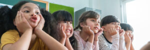 Portrait of Cheerful Multi-ethnic school kids in classroom, Smiling Faces